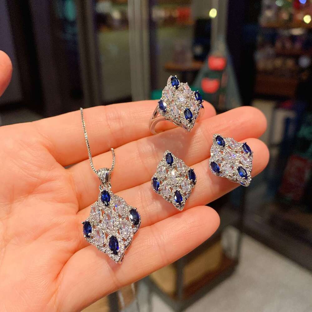 Huayoumei Colorful High Carbon Dia Necklace Ring Three-Piece Set Zircon Pendant Blue Corundum Stud Earrings 97B