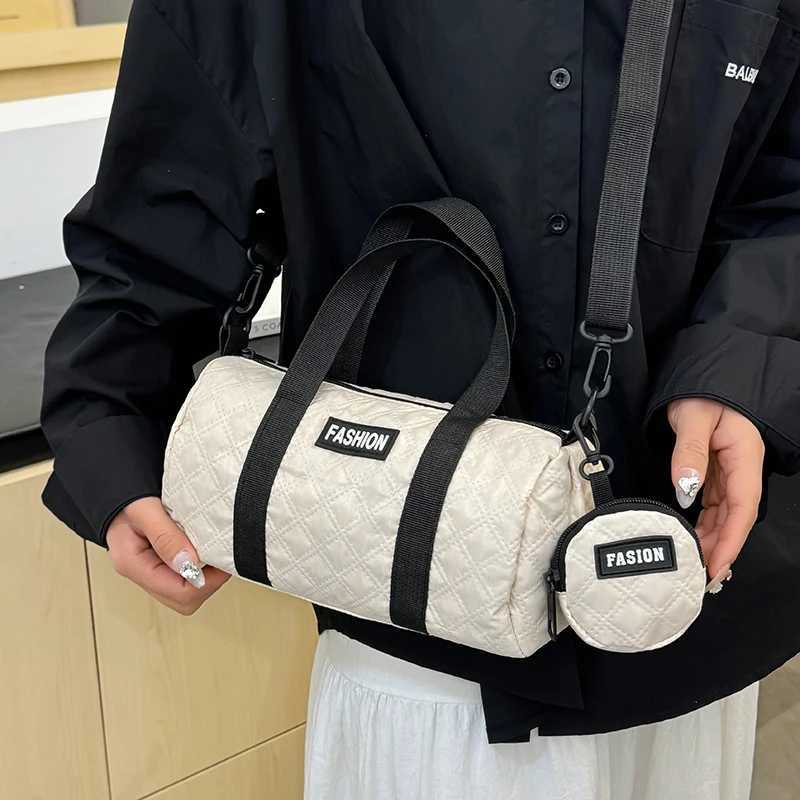 Neutral male and female style nylon fabric handbags single shoulder light and compact cylindrical bags