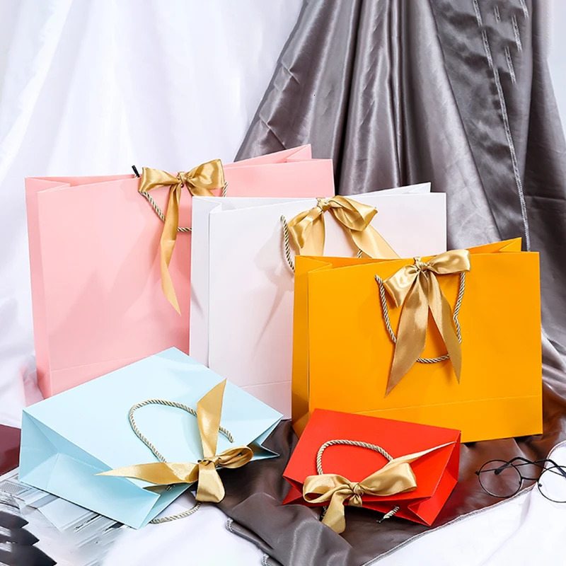 Wholesale Paper Gift Bags with Ribbon Bow Recycled Wedding Shopping Bags with Handles Clothing Cosmetic Jewelry Packaging Bags 250702