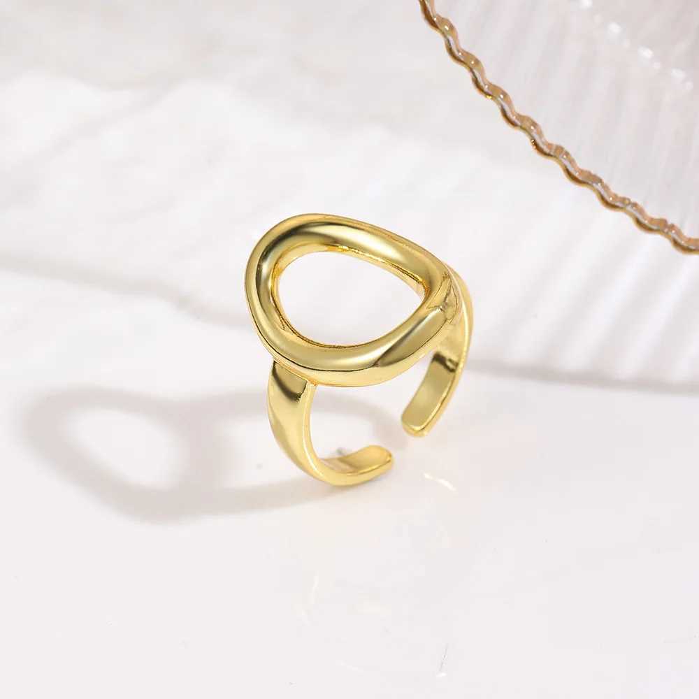 Personalized Fashion Geometric Smooth Oval Open Ring Copper Light Luxury Hollow Simple Adjustable Mens and Womens Ring Jewelry XJ250707