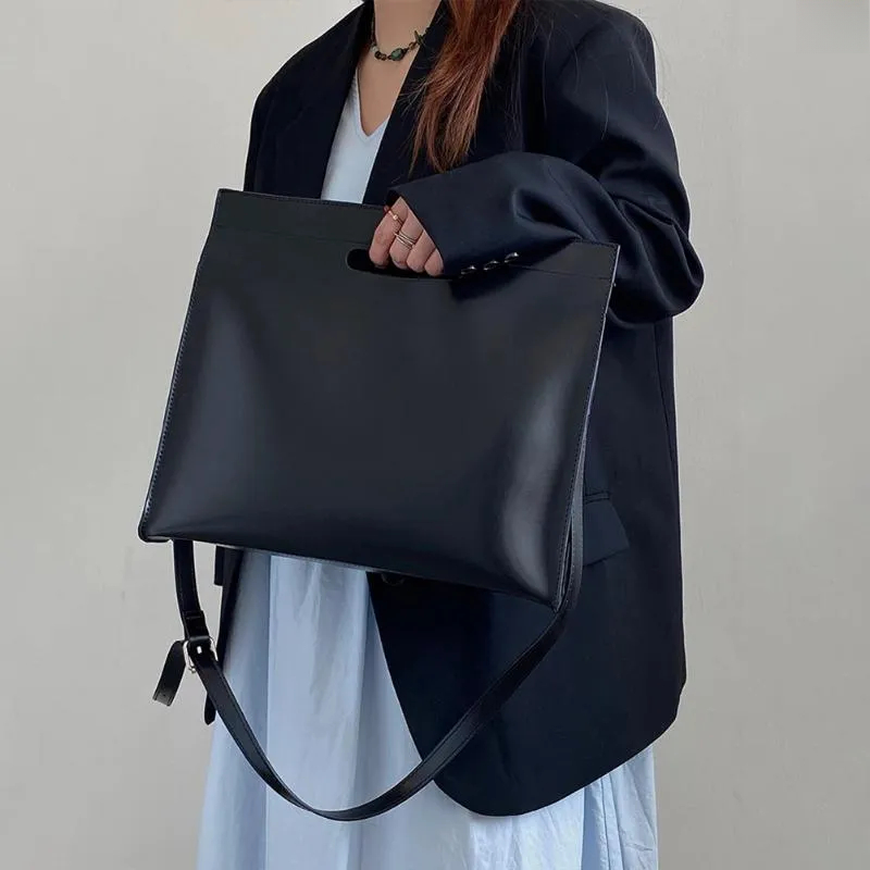 Elegant PU Leather Messanger Bag for Professional Women: Spacious Shoulder & Tote Hybrid Style Handbag