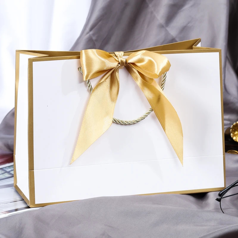 Wholesale Paper Gift Bags with Ribbon Bow Recycled Wedding Shopping Bags with Handles Clothing Cosmetic Jewelry Packaging Bags 250702