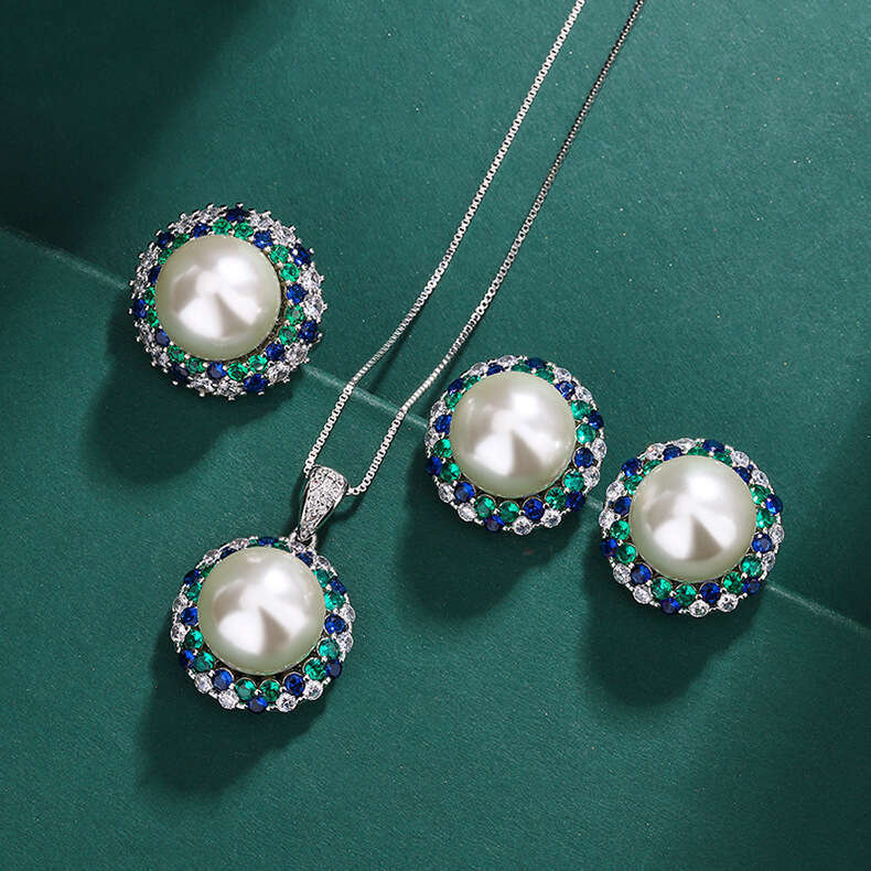 Three-Piece Set Australian Mother-Of-Pearl Necklace Sier Needle Tahitian Pearl Stud Earrings With Emerald Zircon Ring 691