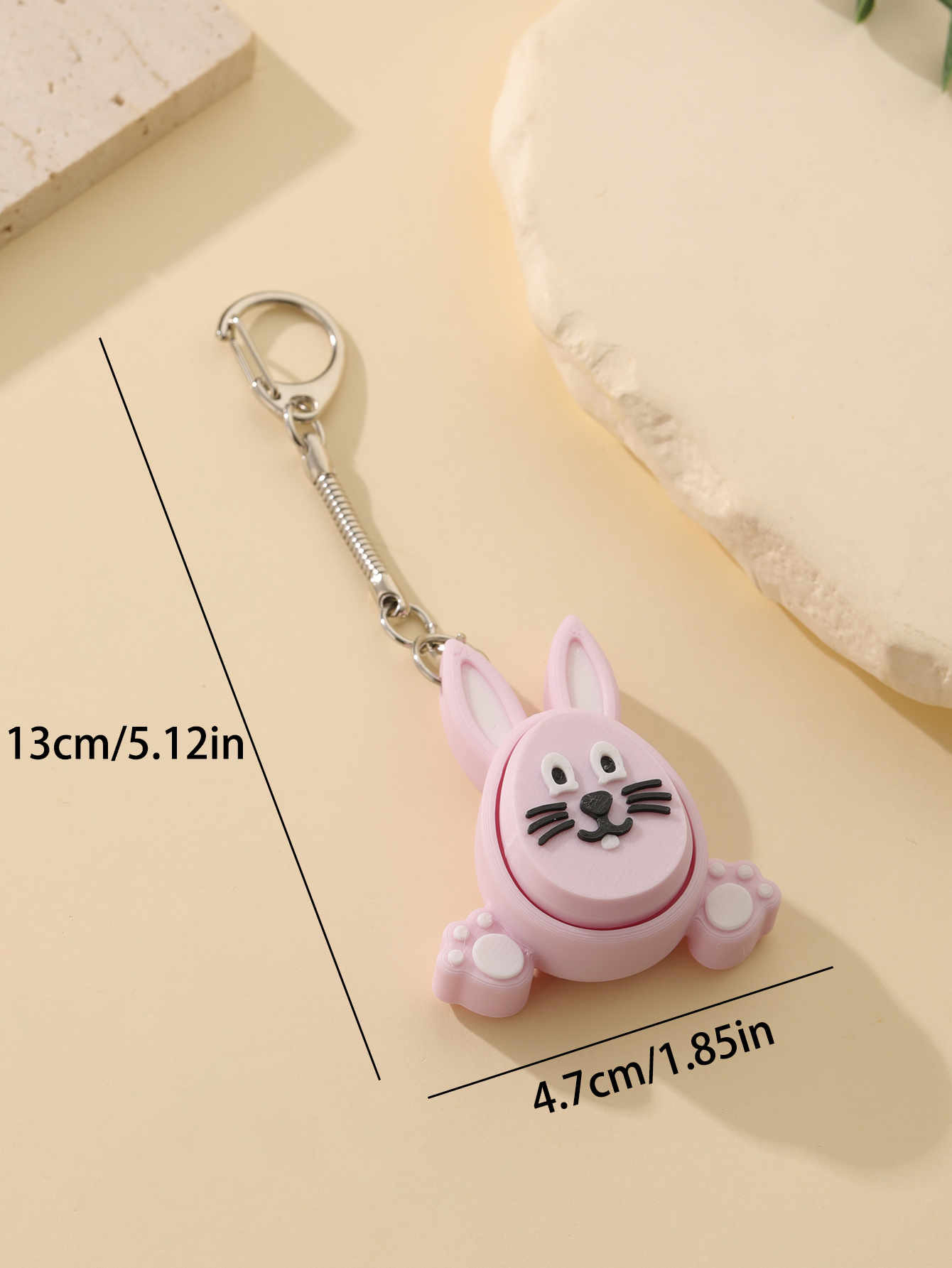 3D printed little rabbit keychain - an adult stress relief toy with a portable anxiety-reducing gadget featuring a clickable keyboard design