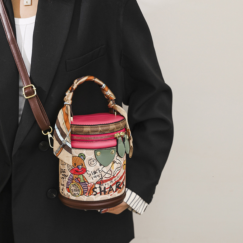 Designer Graffiti Bucket for Women 2025 New Fashion Niche Small Cylinder Handbag Versatile Shoulder Crossbody Light Luxury Women's Bag
