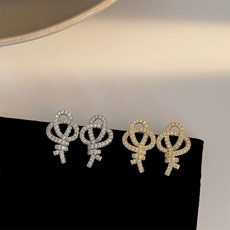 DHcollections New Fashion High-End Design Knot Exquisite Zircon Earrings Elegant Beautiful Compact Simple Commuting Women