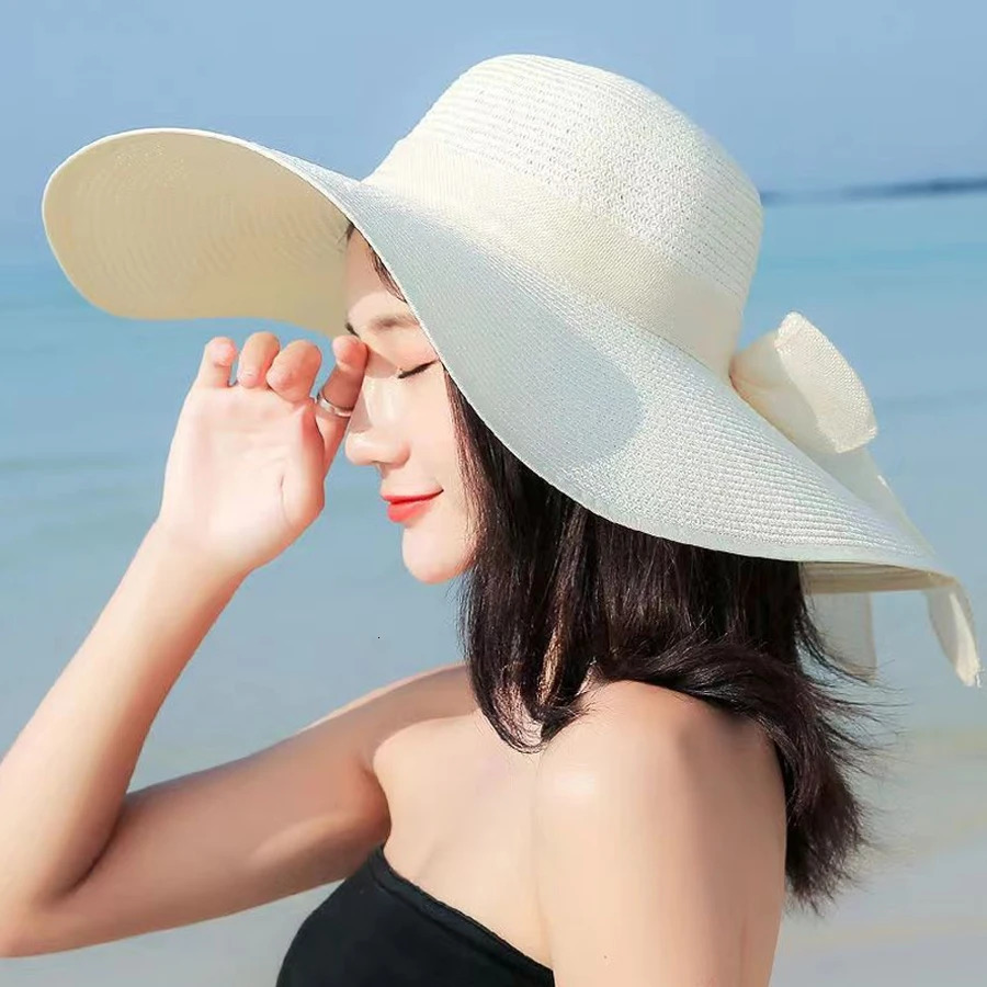 Ladies hats spring and summer styles large brimmed straw UV resistant sun foldable bow shaped hats 250707