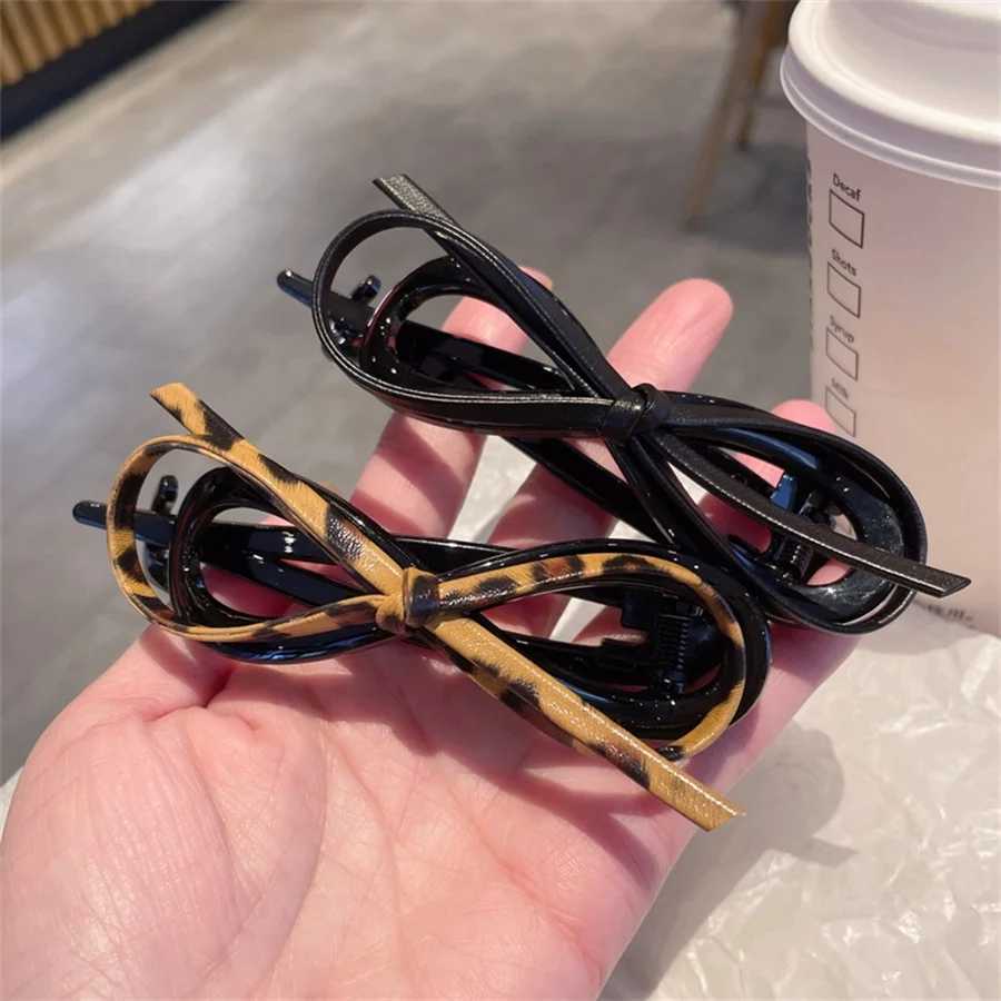 Product temperament leather bow twisted clip for womens back of head high-end feeling one-line clip for 2025 hair accessories Z250707