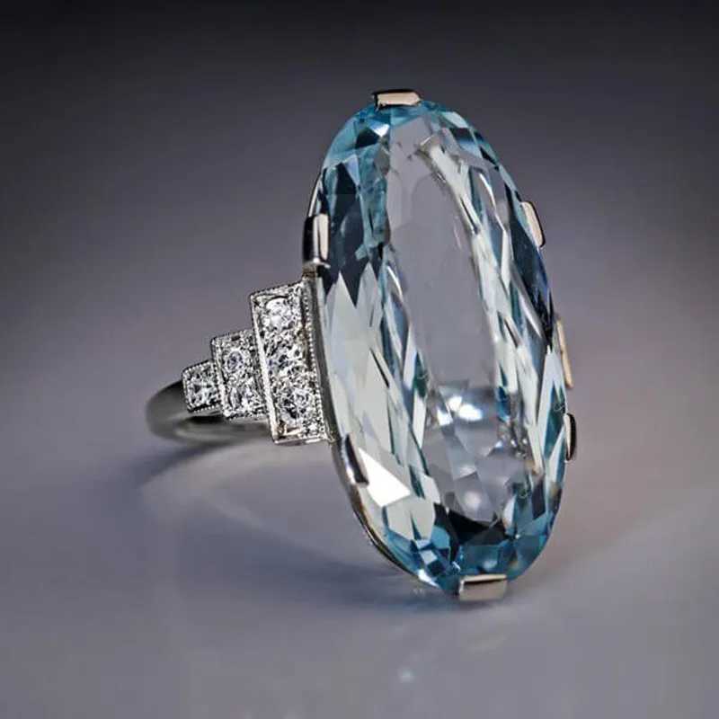 925 Sterling Silver Female Blue Wedding Ring Band Oval Stone Engagement Party Women Luxury Jewelry Shine CZ Stone Jewelry Gift XJ250707