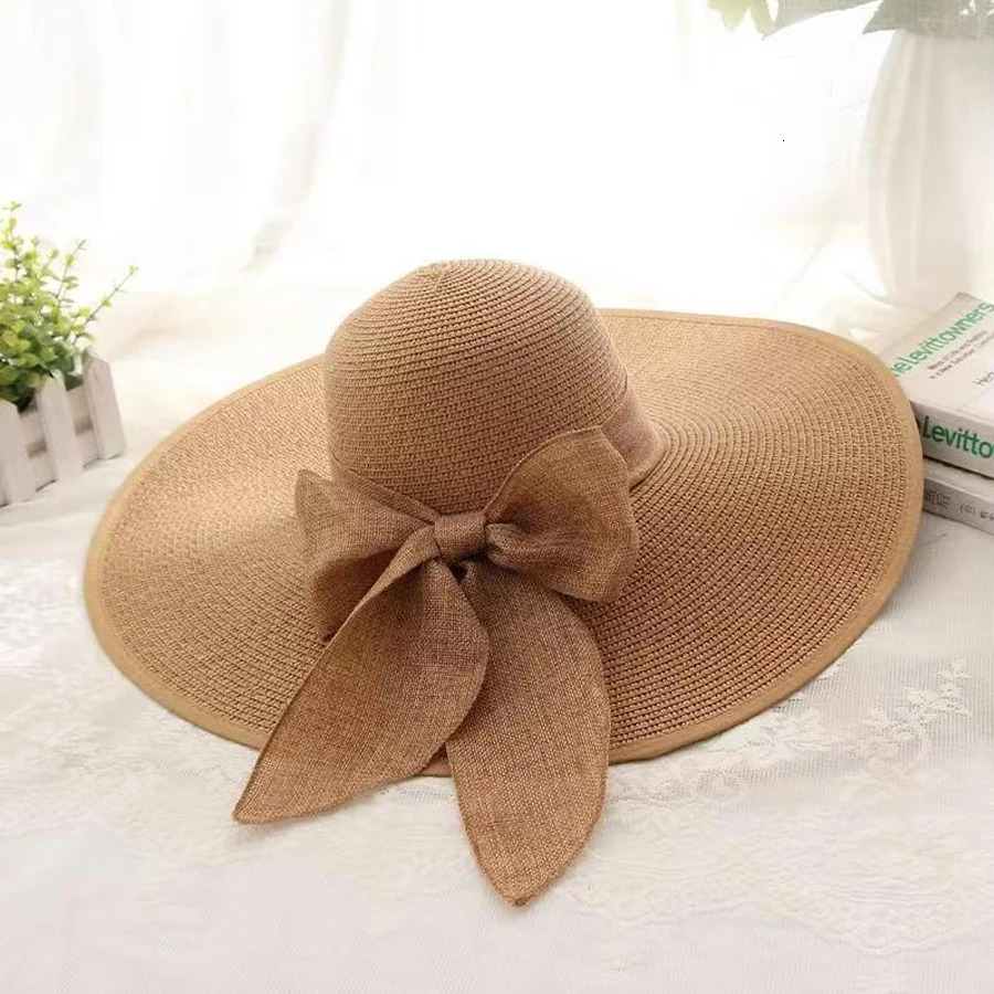 Ladies hats spring and summer styles large brimmed straw UV resistant sun foldable bow shaped hats 250707