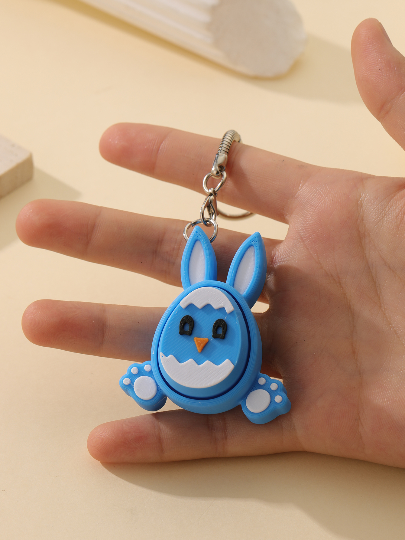 3D printed little rabbit keychain - an adult stress relief toy with a portable anxiety-reducing gadget featuring a clickable keyboard design