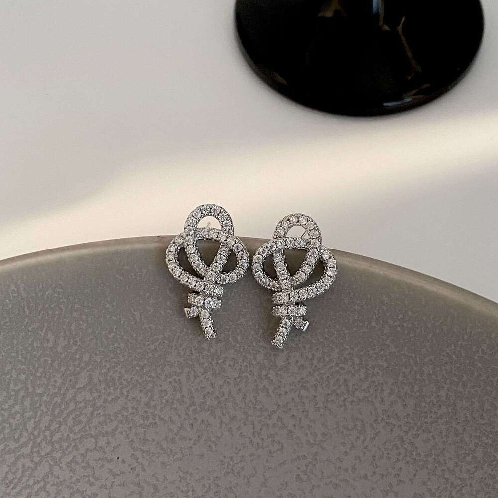 DHcollections New Fashion High-End Design Knot Exquisite Zircon Earrings Elegant Beautiful Compact Simple Commuting Women