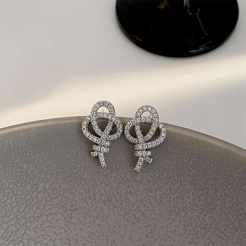 DHcollections New Fashion High-End Design Knot Exquisite Zircon Earrings Elegant Beautiful Compact Simple Commuting Women