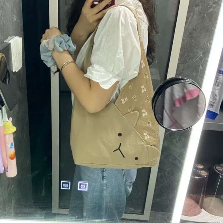 Free shipping designer bag Luxury bag Cute Cat Bucket 2025 Japanese Style New Cartoon Canvas Casual Versatile Large Capacity Commuter Shoulder Bag
