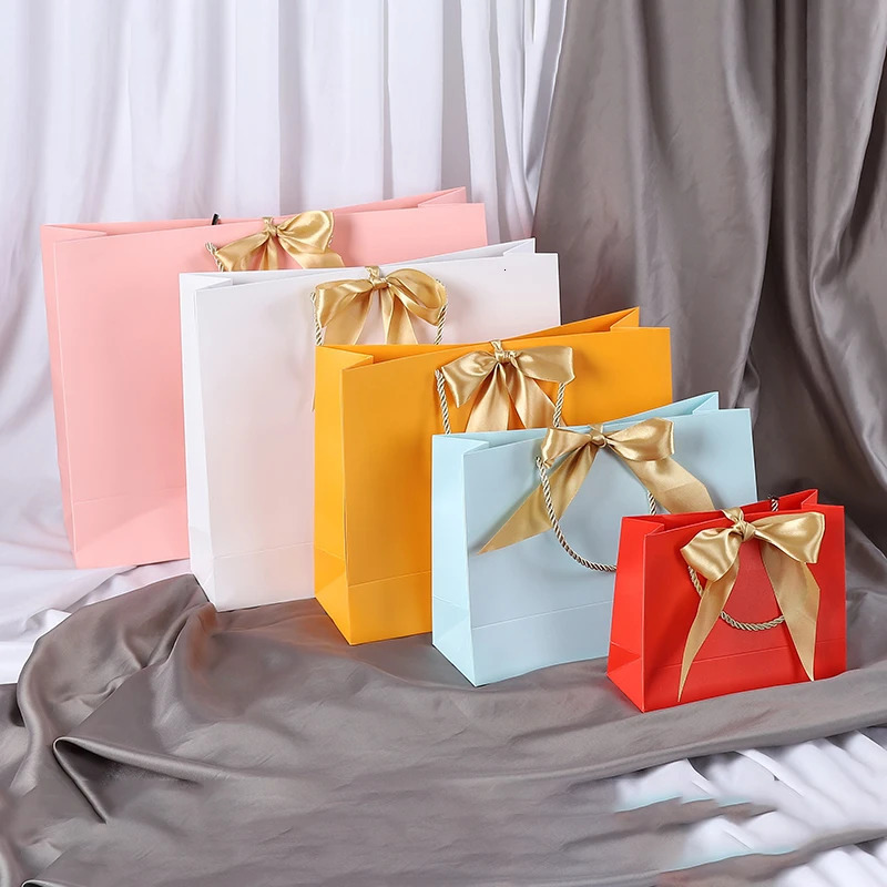 Wholesale Paper Gift Bags with Ribbon Bow Recycled Wedding Shopping Bags with Handles Clothing Cosmetic Jewelry Packaging Bags 250702