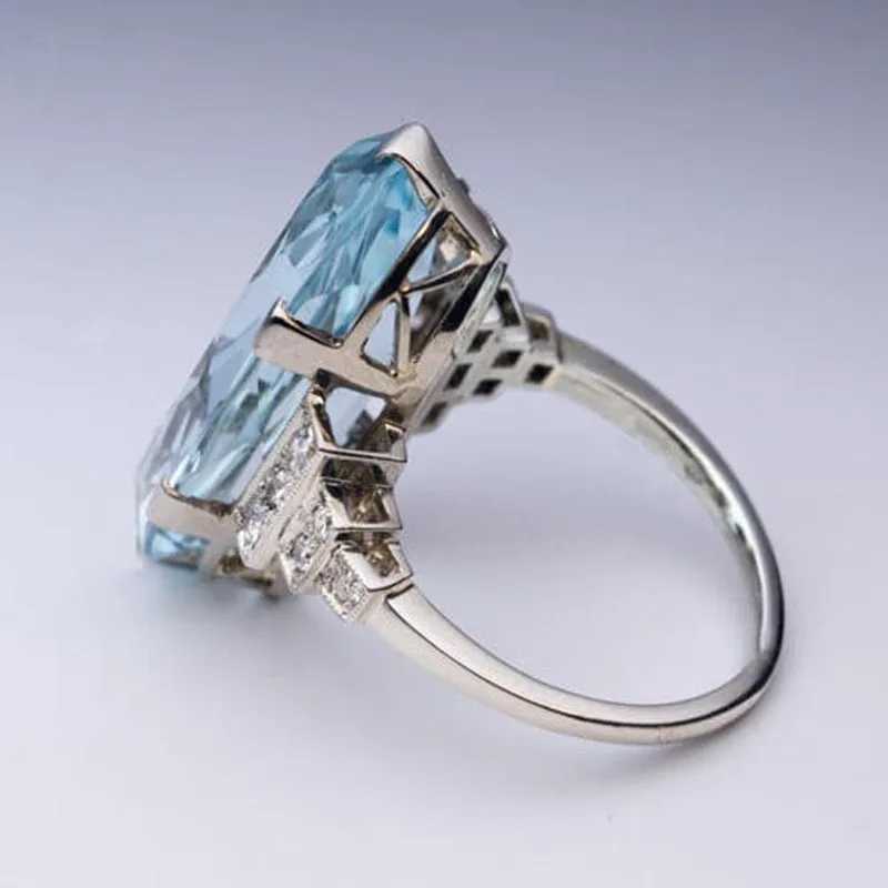 925 Sterling Silver Female Blue Wedding Ring Band Oval Stone Engagement Party Women Luxury Jewelry Shine CZ Stone Jewelry Gift XJ250707