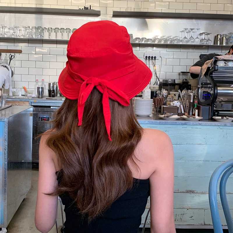 Korean Retro Red Strap Bucket Hats 2024 New Summer Travel Versatile Sunscreen Show Face Small Sweet Beautiful Womens Caps Y250707