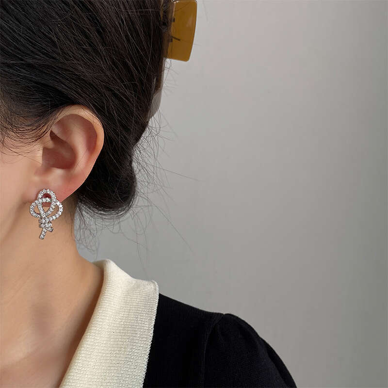 DHcollections New Fashion High-End Design Knot Exquisite Zircon Earrings Elegant Beautiful Compact Simple Commuting Women