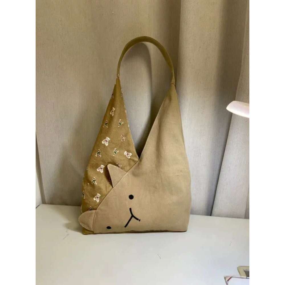 Free shipping designer bag Luxury bag Cute Cat Bucket 2025 Japanese Style New Cartoon Canvas Casual Versatile Large Capacity Commuter Shoulder Bag