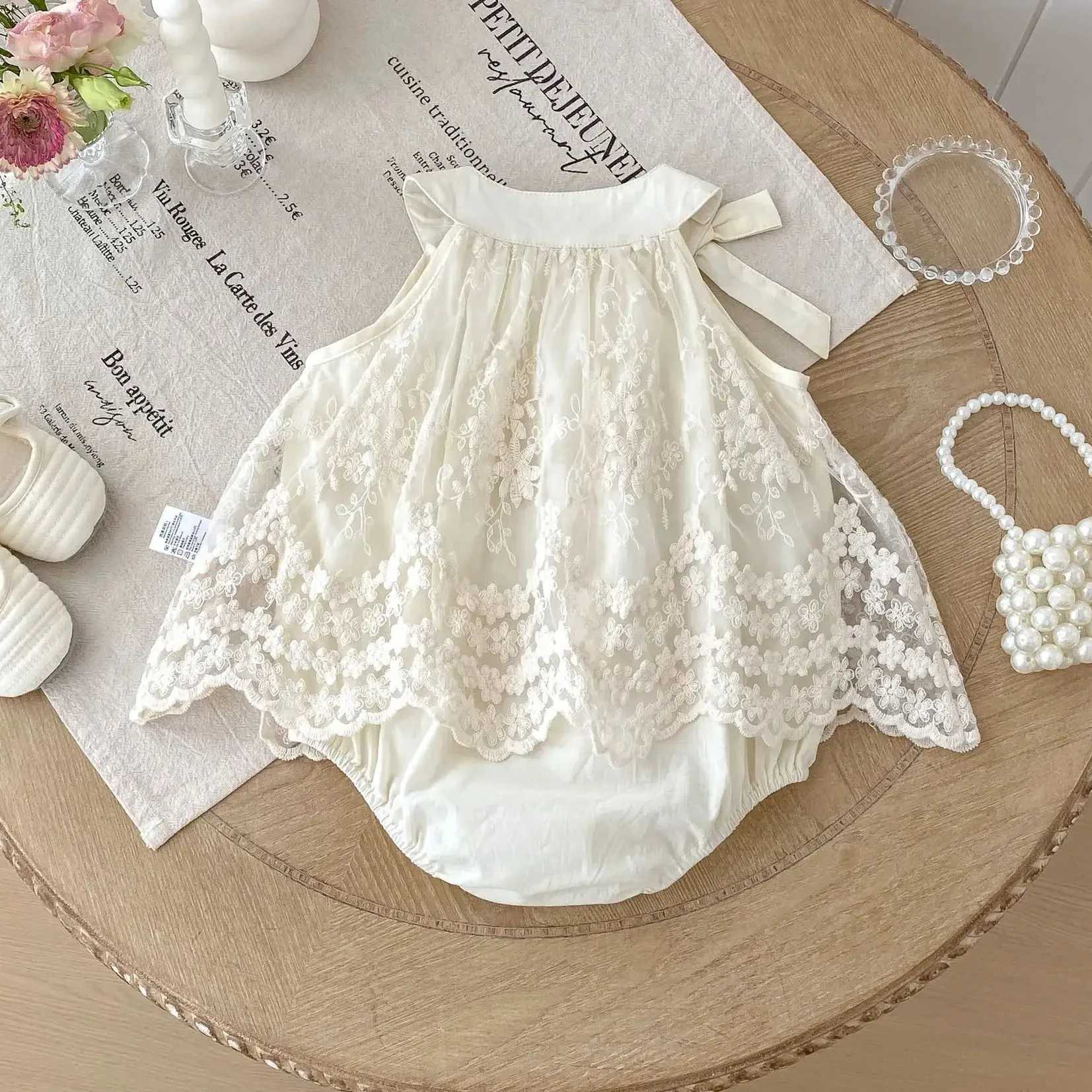0-24M Infant Baby Girl Ivory Lace Embroidered Romper for Newborns Satin Bow Peter Pan Collar Sleeveless Onesie Baby Bodysuits R250707