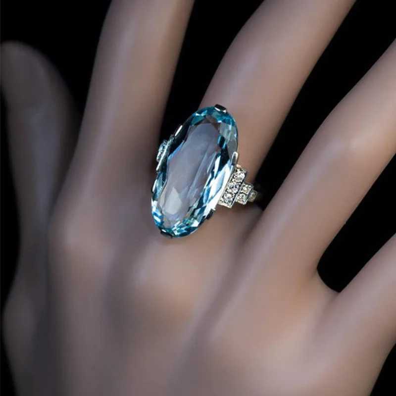 925 Sterling Silver Female Blue Wedding Ring Band Oval Stone Engagement Party Women Luxury Jewelry Shine CZ Stone Jewelry Gift XJ250707