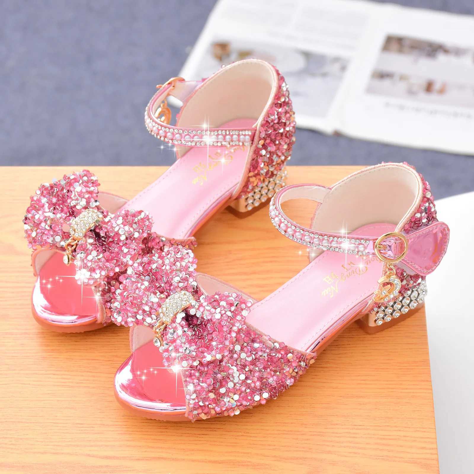 2025 New Childrens Summer Sandals Crystal Bowknot Girls High Heels Soft Sole White Princess Wedding Performance Shoes R250707