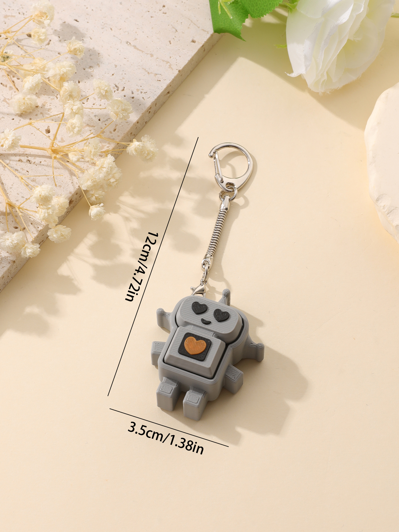 3D printed robot keychain - an adult stress relief toy with a portable anxiety-reducing gadget featuring a clickable keyboard design