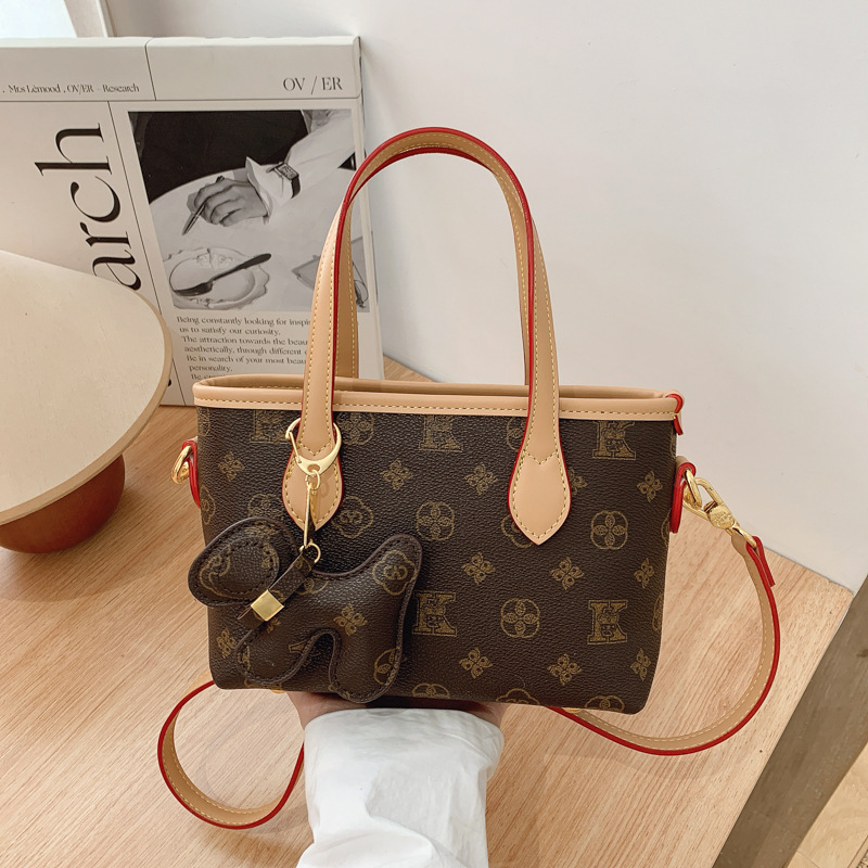 Designer High-End Handheld Basket for Women 2025 New Printed Bucket Shoulder Crossbody Light Luxury Women's Bag