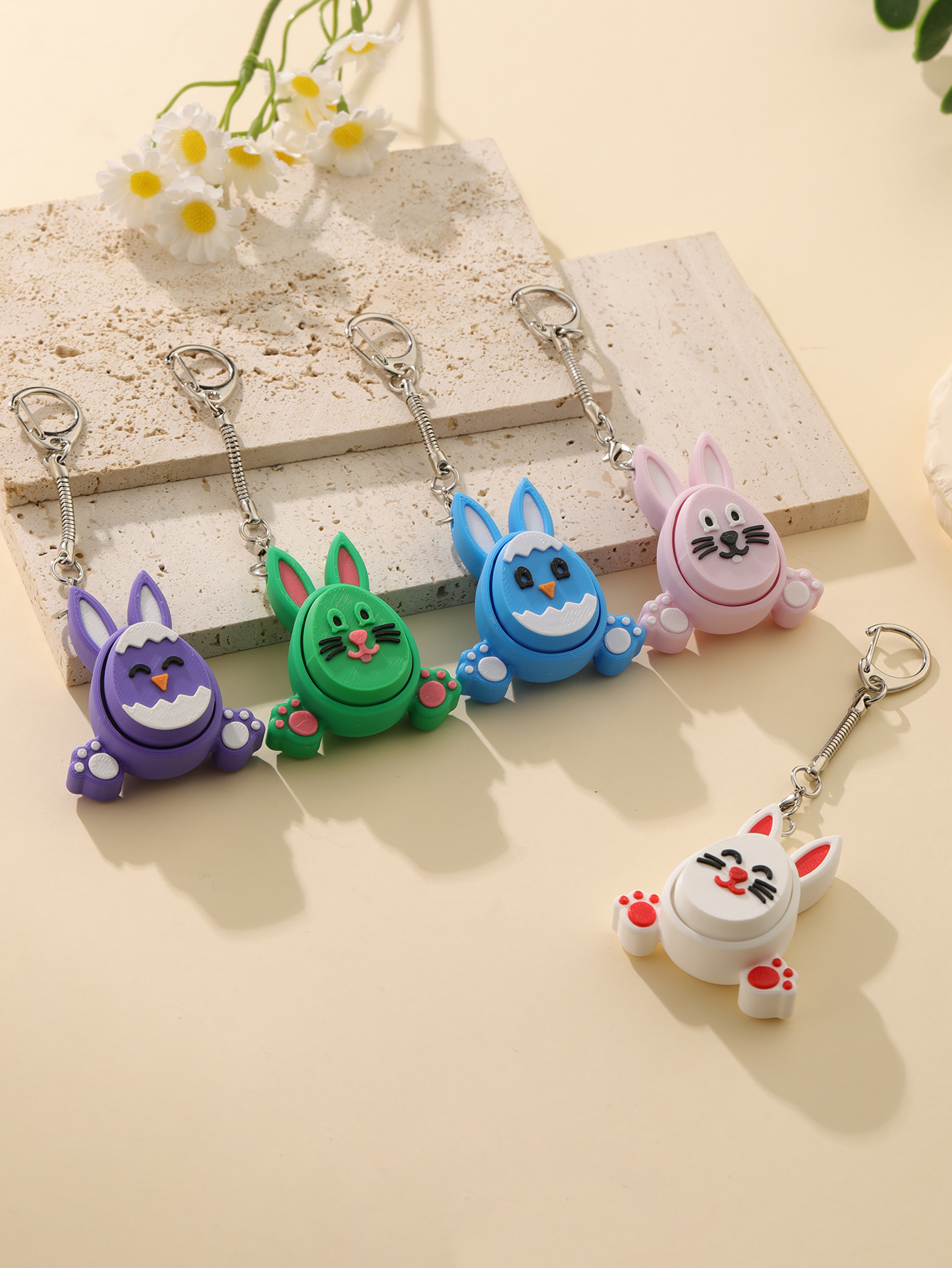 3D printed little rabbit keychain - an adult stress relief toy with a portable anxiety-reducing gadget featuring a clickable keyboard design
