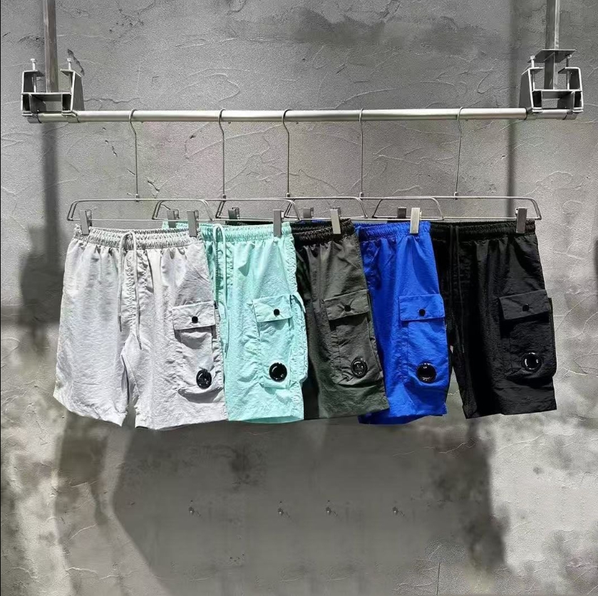 designer shorts mens shorts quick drying shorts loose casual couple casual five quarter pants men M-2XL