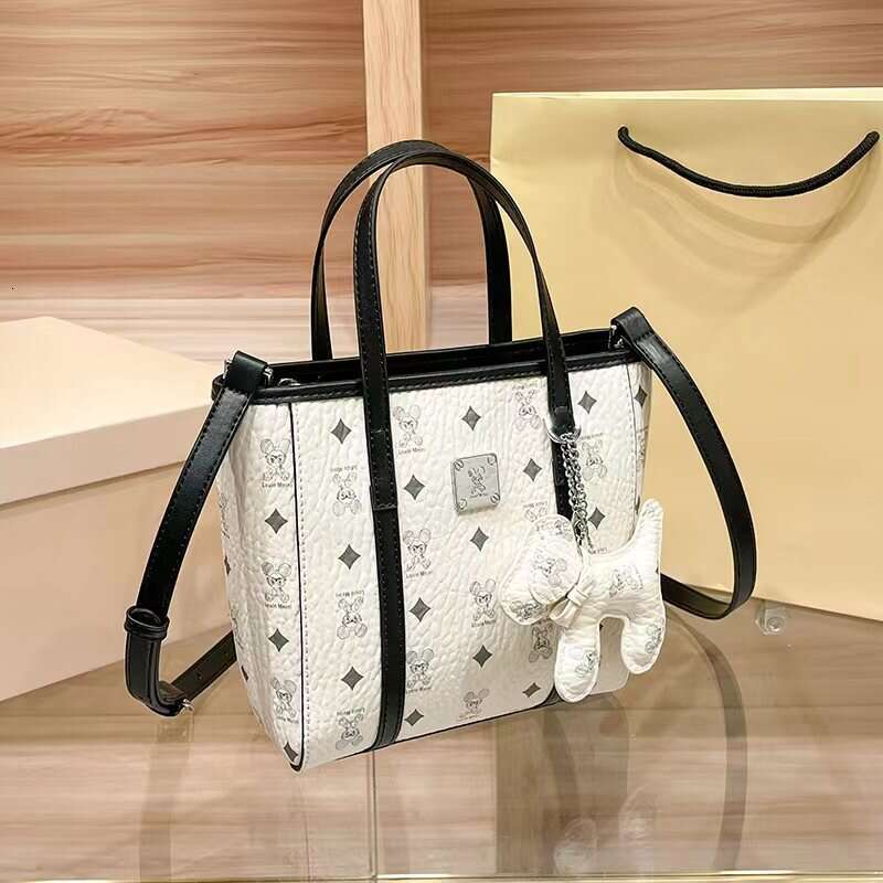 2025 New Women's Tote with Printed Fashion Texture, High-end Feel, Suitable for Middle-aged Women, Handheld, Shoulder, and Crossbody Small Bag Tr