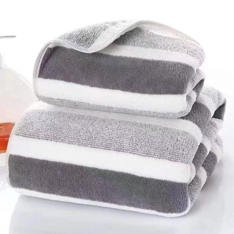 Thickened absorbent large - sized bath towels and beach towels soft and skin - friendly made of 100% coral fleece also suitable as household face towe