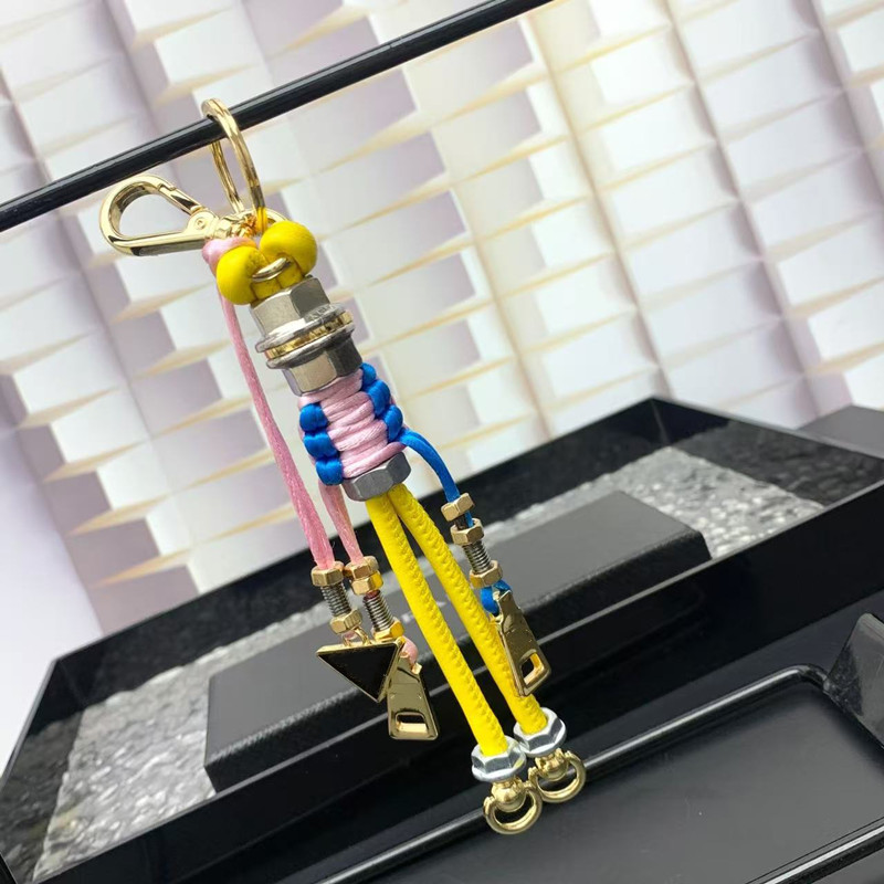 Luxury designers keychains Pads Pop Strings bag charm with Robot Saffiano keychain top Car Key Chain Women Buckle jewelry Keyring Bags Pendant Exquisite Gift