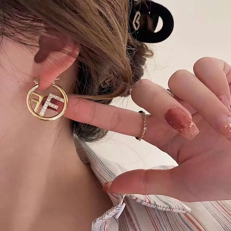 DHCollections Minimalist 'F' Letter Hoop Earrings - Luxury Gold/Silver Geometric Ear Cuffs for Women & Men (2025 New Arrival)