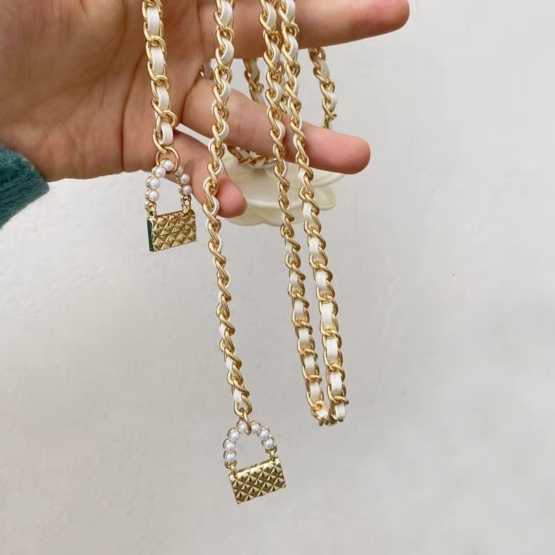 Korean Fashion Black and White Camellia Waist Chain for Women High-End Chanel Style Pearl Flower Chain Belt to Pair with Dresses 250710