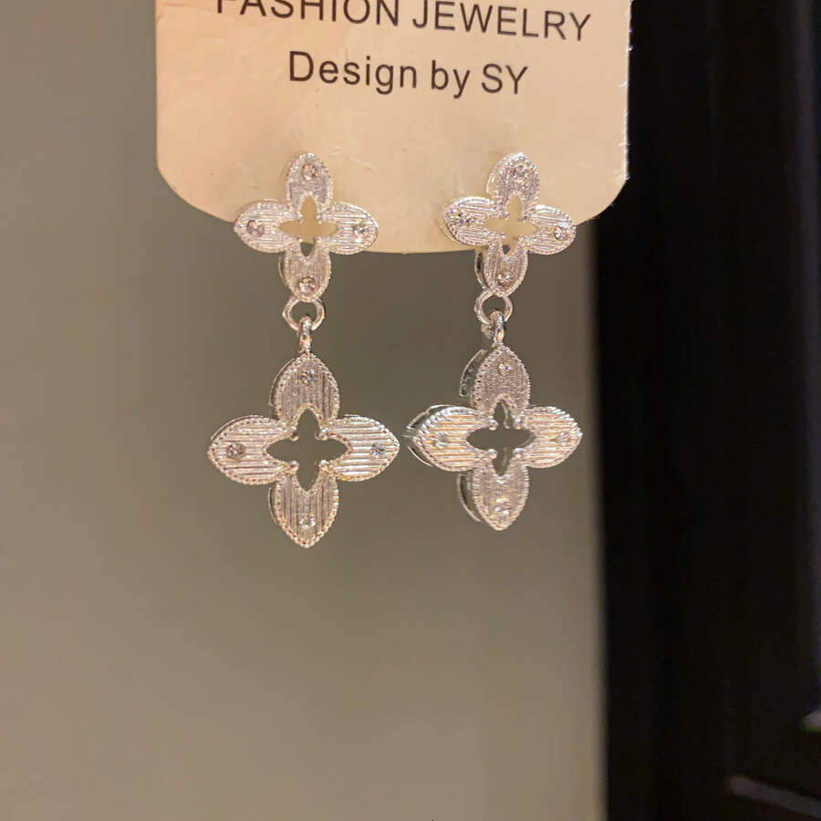 INS Luxury jewelry designer earrings For Women silver needle inlaid with diamonds hollowed out flower pendant high-end clover earrings exquisite simpl