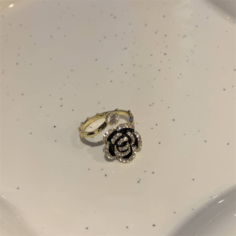 South Korea Dongdaemun Black Camellia Micro Pave Zircon Open Ring for Women High-end Light Gentle Temperament Ring 250710