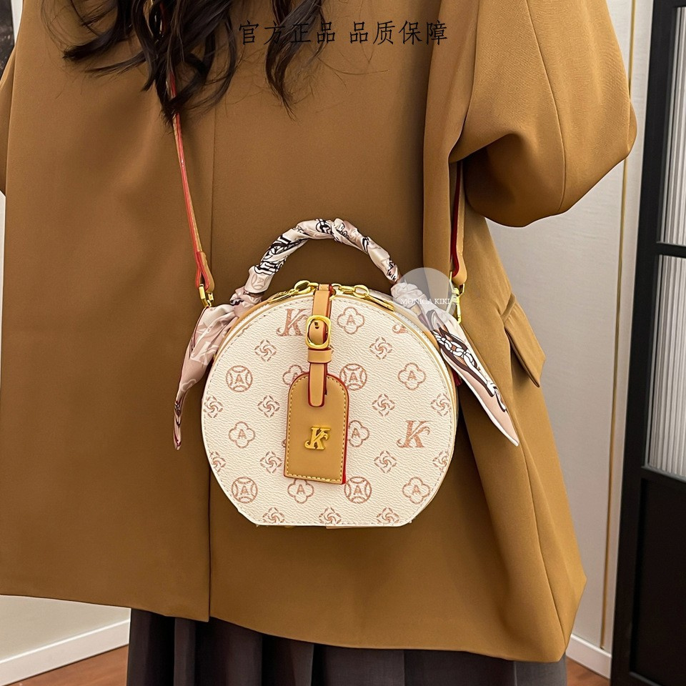Designer bag free shipping fashion light luxury Fashionable small round bag versatile casual shoulder bag color blocked letters