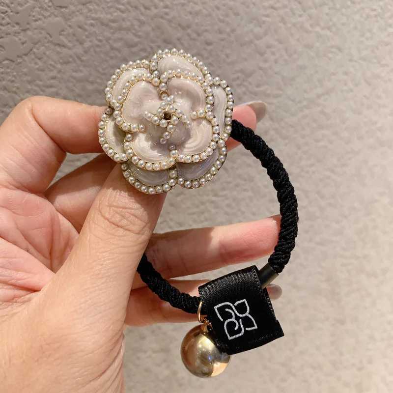 2025 Vintage Camellia Bow Pearl Hair Tie Flower Tie Ponytail Black and White Hair Rope Rubber Band Big Brand Luxury Y250711