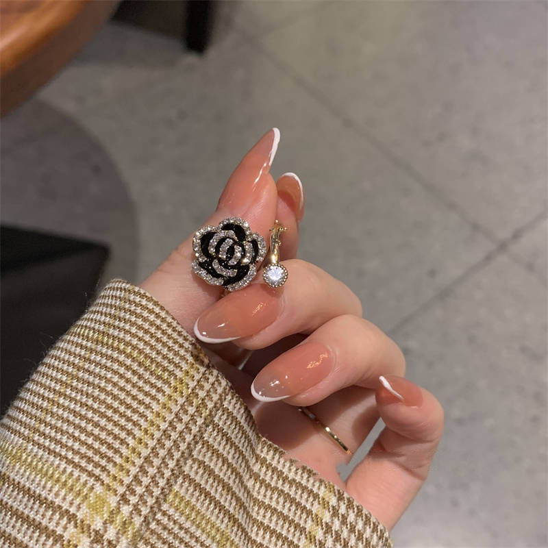 South Korea Dongdaemun Black Camellia Micro Pave Zircon Open Ring for Women High-end Light Gentle Temperament Ring 250710
