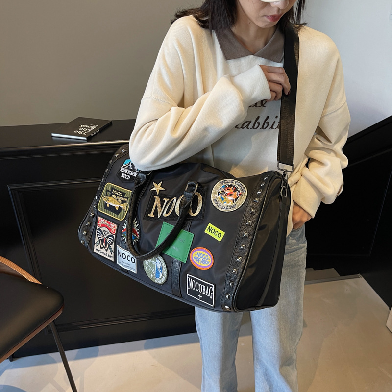 Gym-goer 2025 new Fashion Rivet Badge Luggage Storage Bag for Business Trips and Travel Large-capacity Handheld Outdoor Sports and Fitness Bag Single-
