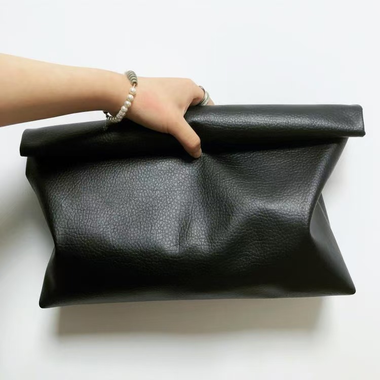 Black style minimalist PU leather rolled edge large capacity handbag for women, European and American retro artistic clutch bag, casual clip bag