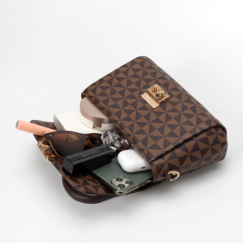 2025 new free shipping designer Geometric Patterned Satchel Bags with Top Handle Tassel Detail Adjustable Strap Stylish and Elegant for Daily Outings