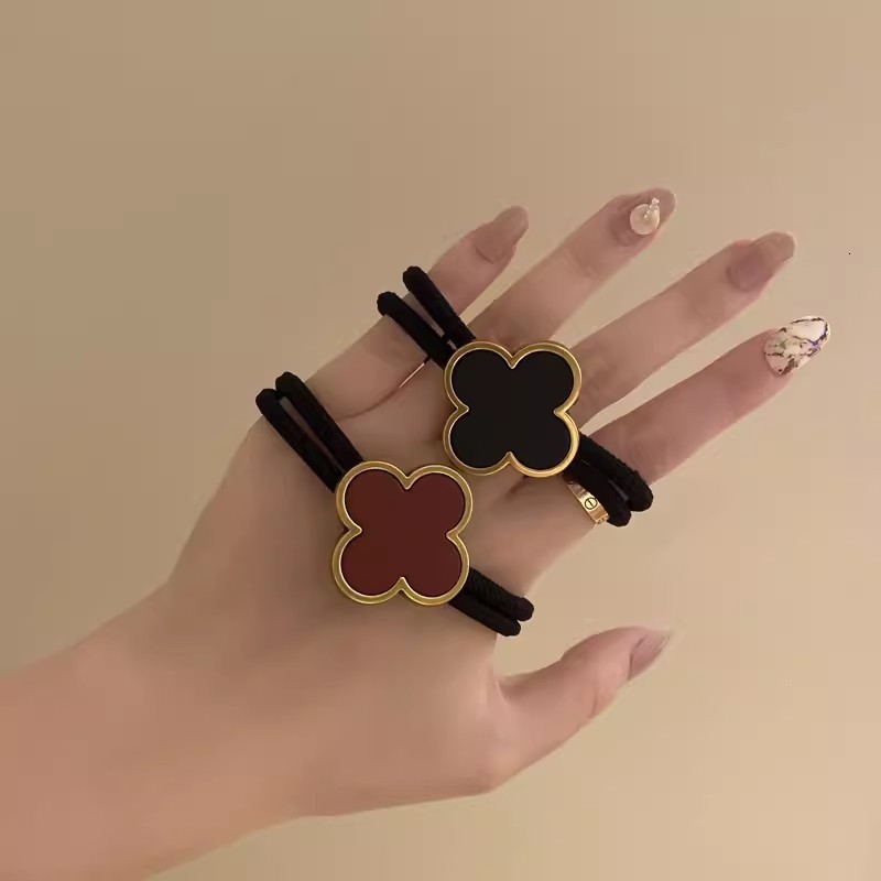 Korean Four-Leaf Clover High-End Hair Tie for Women Summer Non-Tightening Simple Elegant Ponytail Hair Band Black Leather Cover 250711