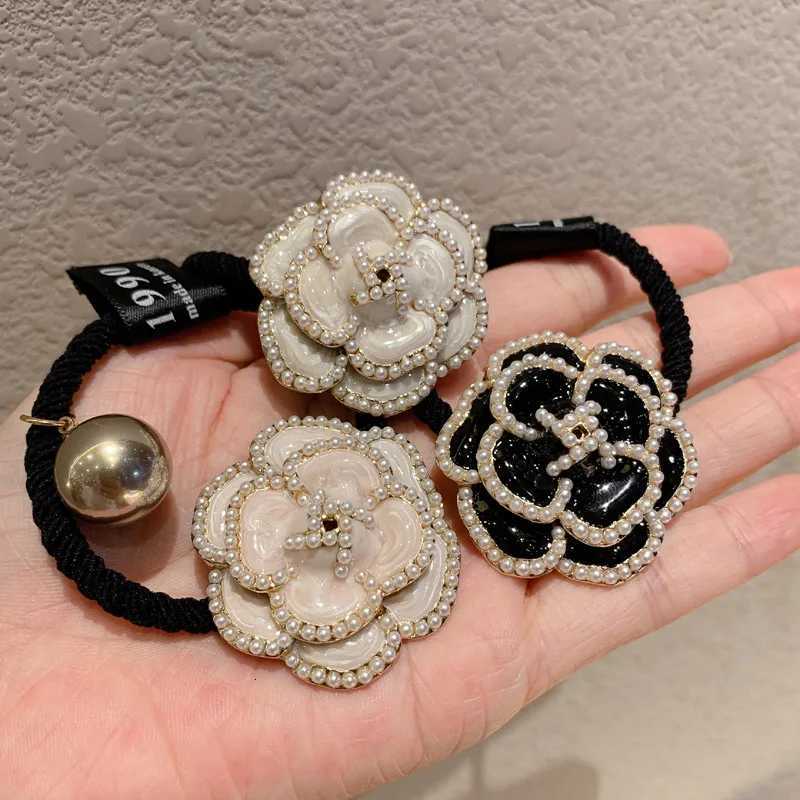 2025 Vintage Camellia Bow Pearl Hair Tie Flower Tie Ponytail Black and White Hair Rope Rubber Band Big Brand Luxury Y250711