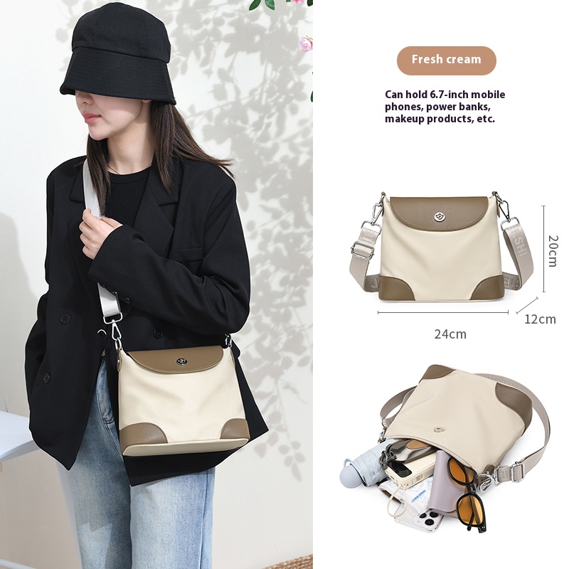 Simple color-blocked crossbody bag for women, made of nylon and leather. A versatile and chic single-shoulder bag for daily use.