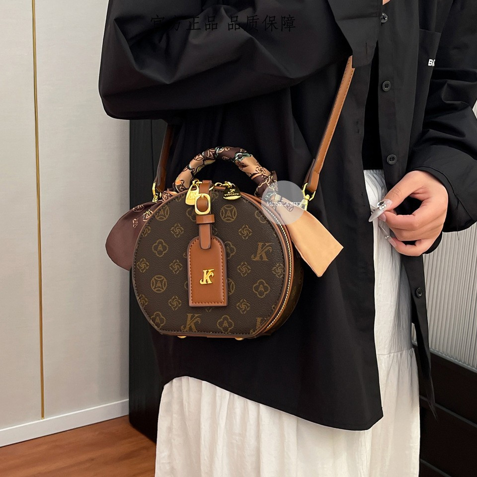 Designer bag free shipping fashion light luxury Fashionable small round bag versatile casual shoulder bag color blocked letters