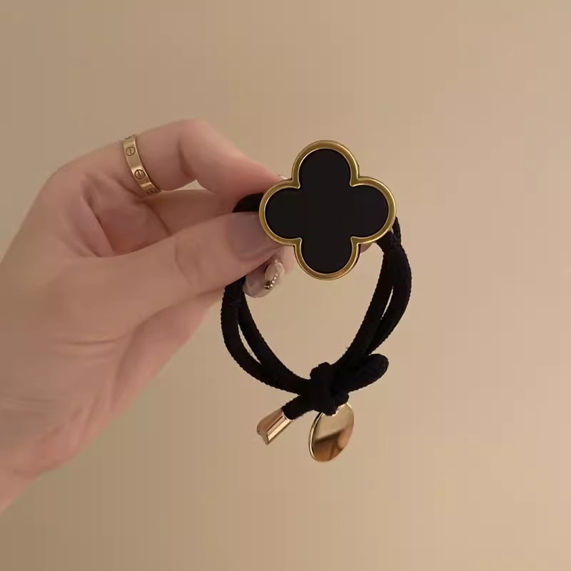 Korean Four-Leaf Clover High-End Hair Tie for Women Summer Non-Tightening Simple Elegant Ponytail Hair Band Black Leather Cover 250711