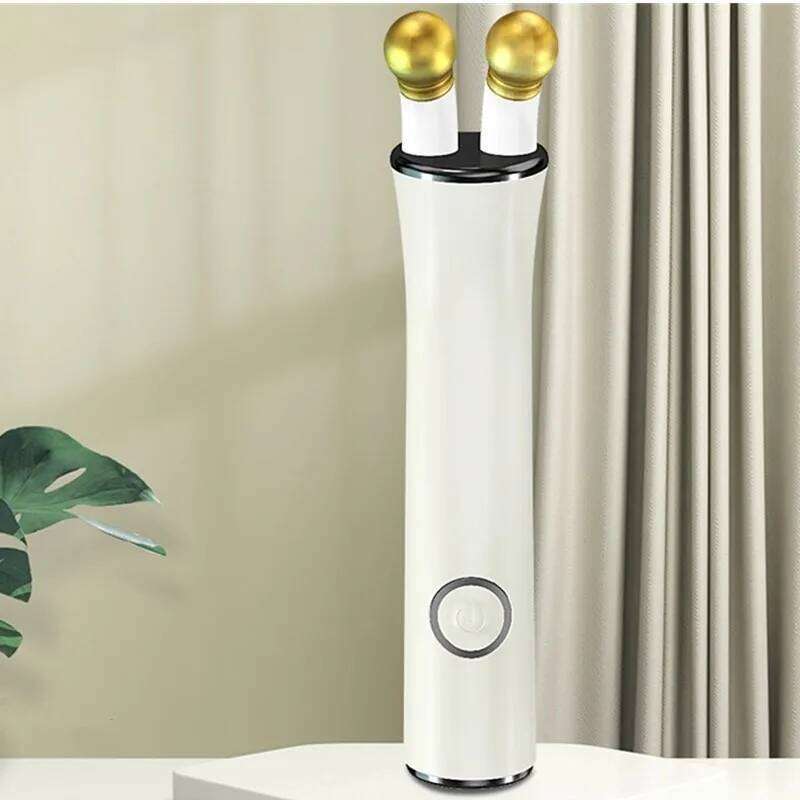 New Handheld Eye Roller Massager Wand Heat Vibration Skin Care Beauty Device