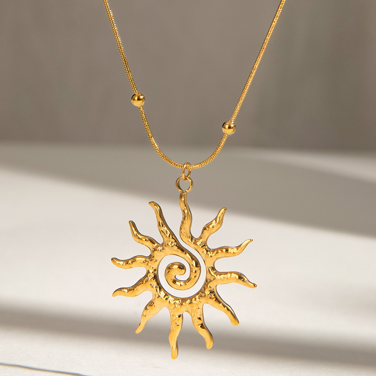 Luxury Jewelry Designer Jewelry Wanxing European And American Style Stainless Steel Hammered Spiral Sun Pendant Necklace Light Luxury Titanium Steel C